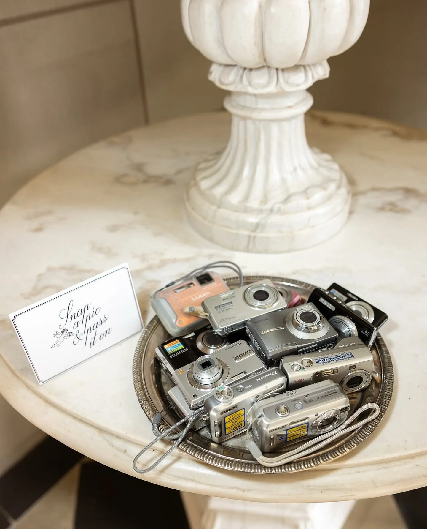 Dig out those digi cams and let your guests go wild!! 📸

Photo by @bygemmathomas 
Stationery @raandco.design