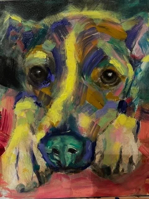 Colorful abstract painting of a dog's face with expressive brush strokes and vibrant colors.
