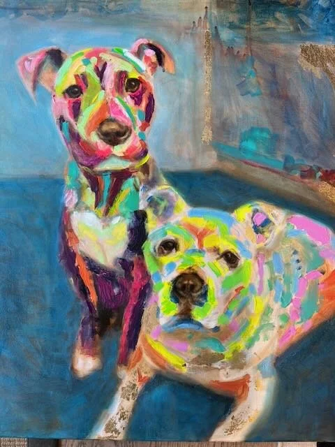 Colorful abstract painting of two dogs sitting indoors, with one dog standing and the other lying down.