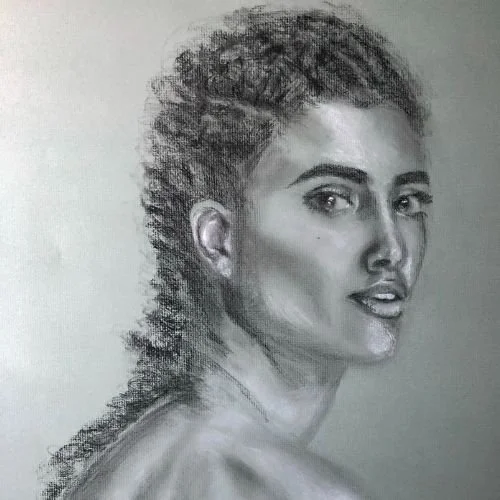 A realistic charcoal sketch of a woman with short, curly hair and a confident expression.