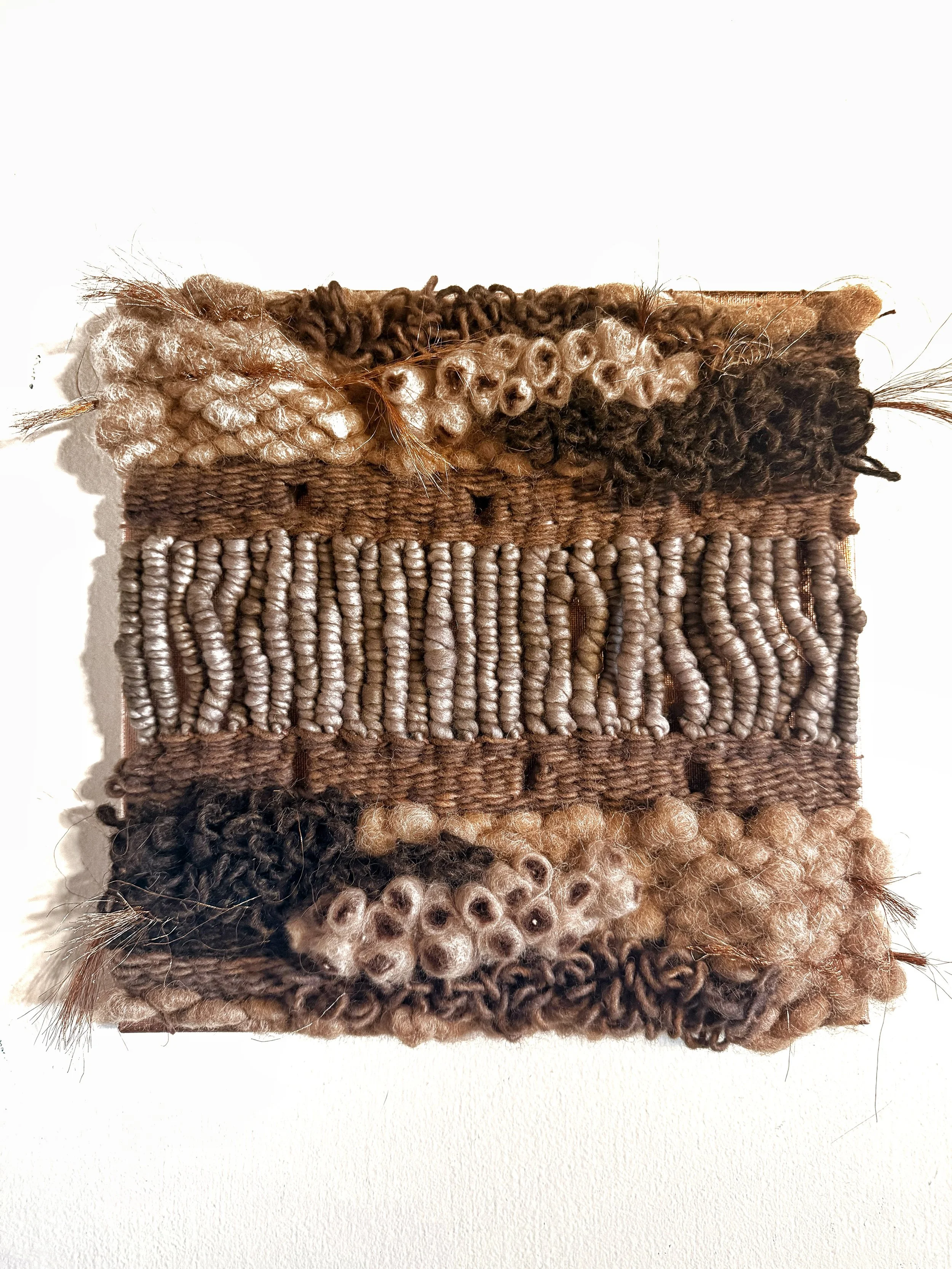 &ldquo;Strata&rdquo; was created with Navajo Churro wool, Merino wool, color core yarn and copper strings. 12&rdquo; x 12&rdquo;. Feeling the earthy tones as we move into fall.
