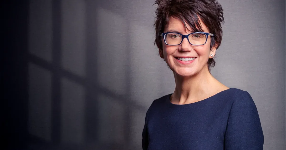 Studio headshot of a businesswoman with glasses, example of corporate headshot photography for Hertfordshire and Harpenden clients