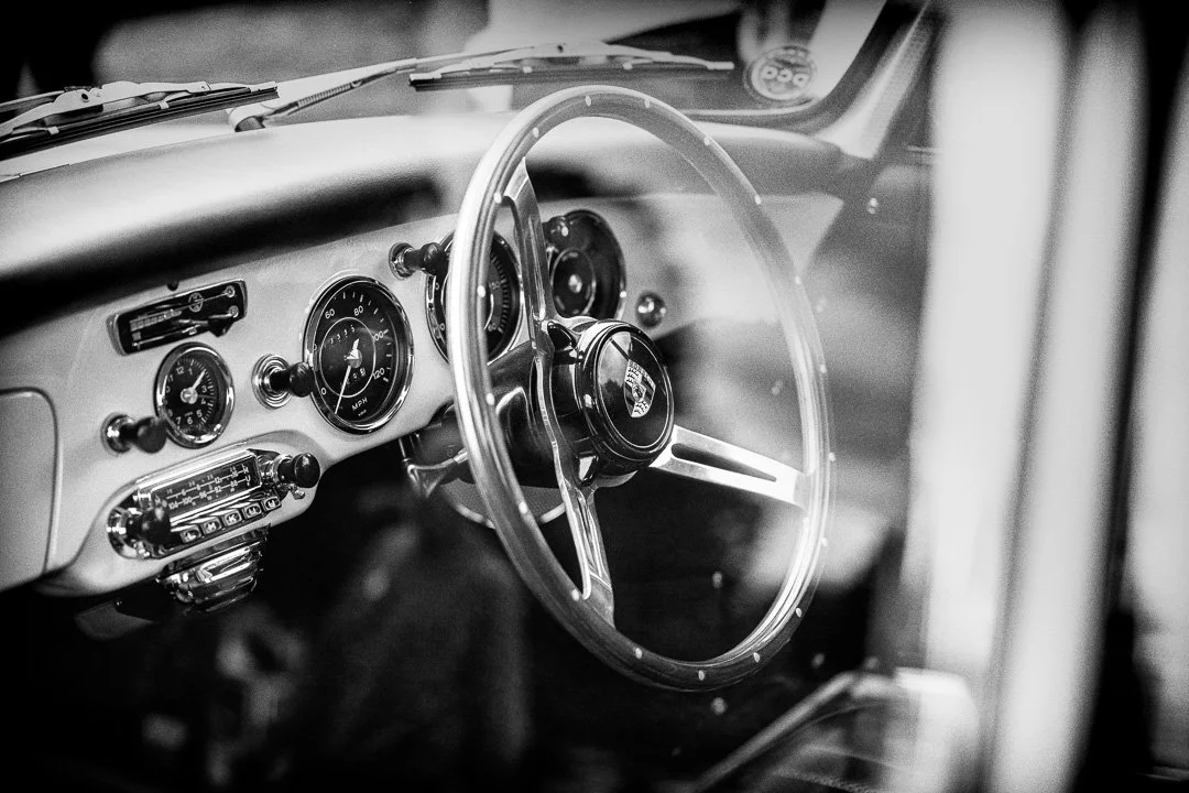 Classic Porsche car interior dashboard and steering wheel.jpg