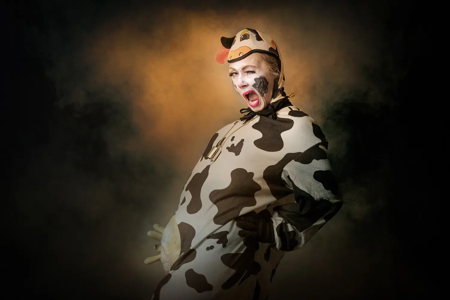 panto-character-portrait-female-in-a-cows-costume.webp