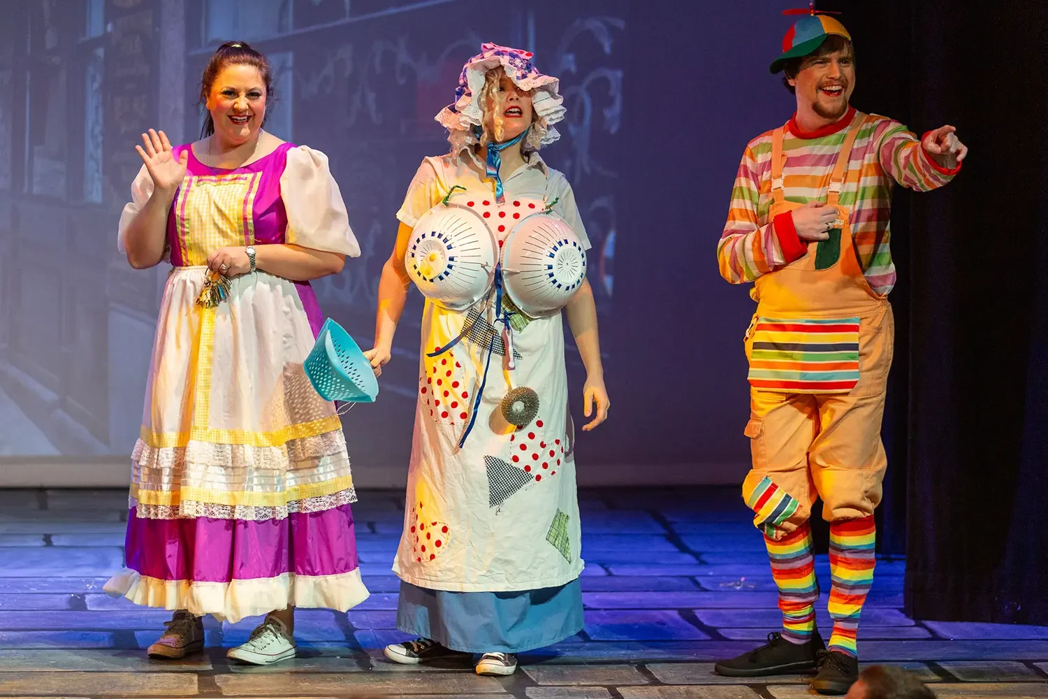 panto-stage-performance-comedy-trio.webp