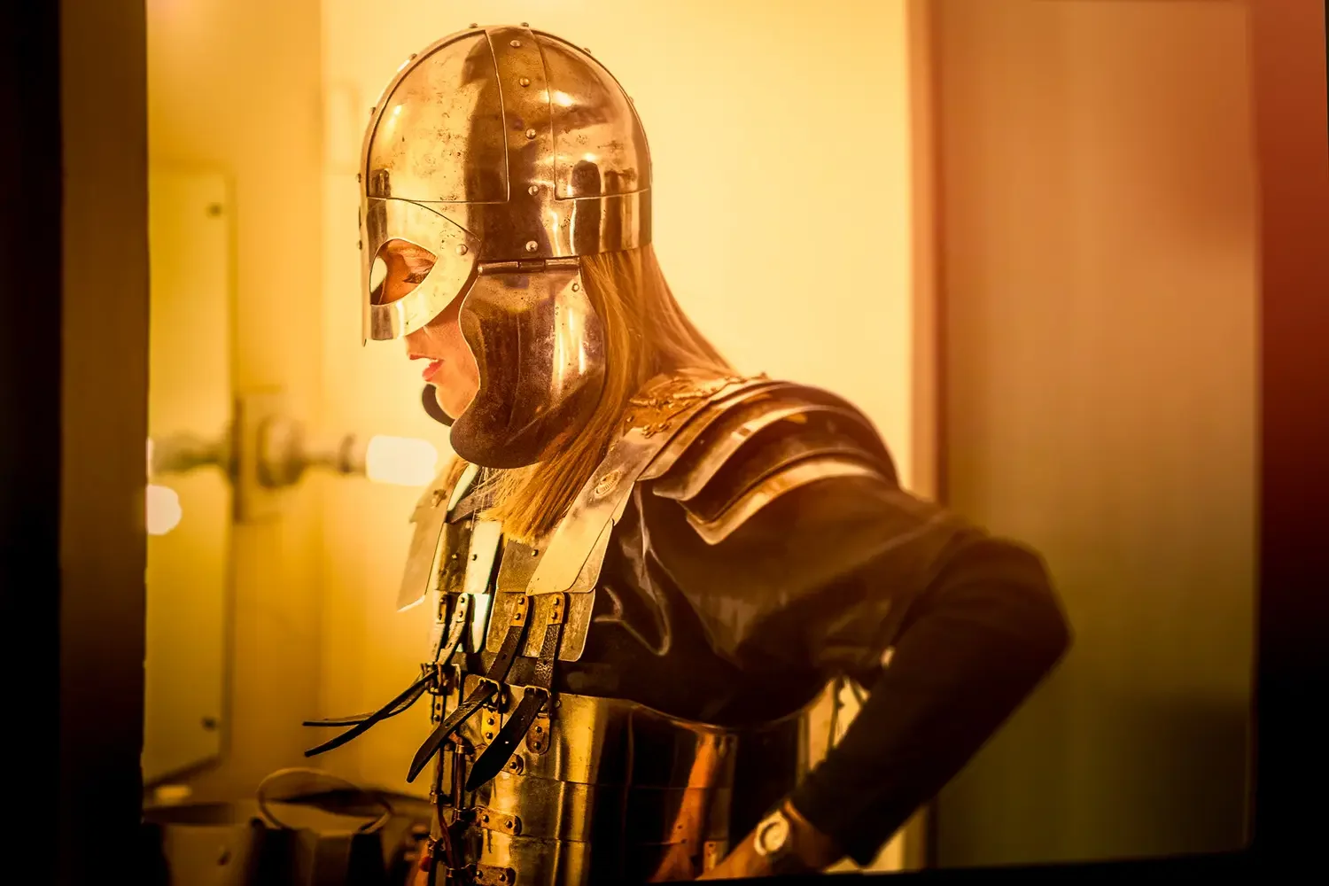 Panto-character-dressed-in-a-knights-costume-takes a breath.webp