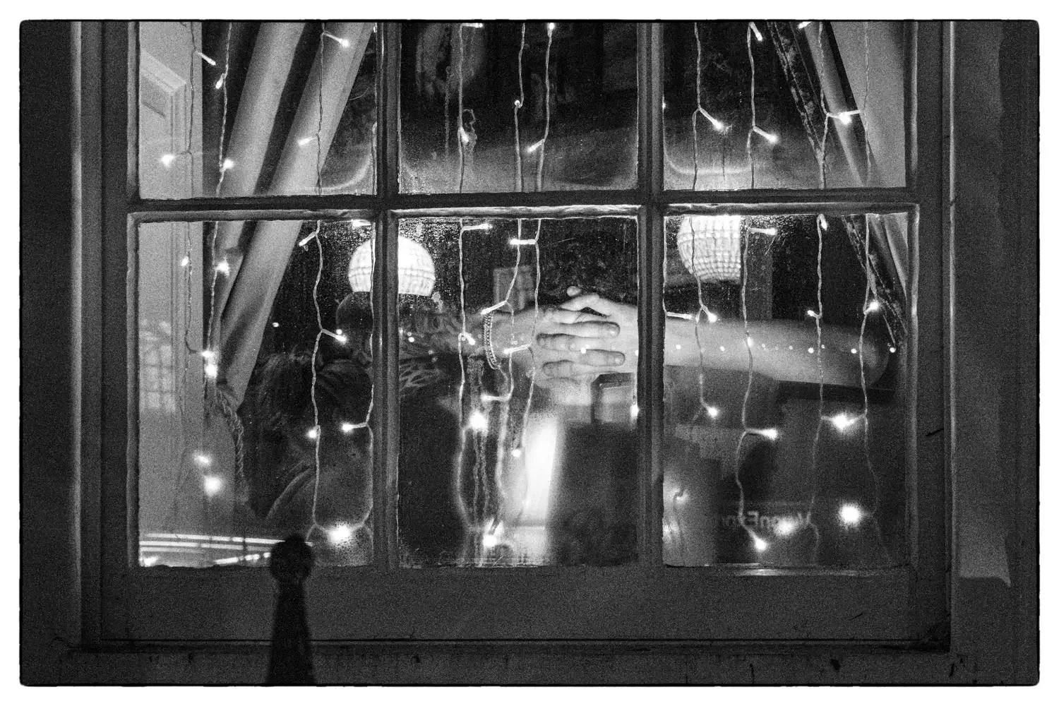 Hands behind the head in a St Albans Pub.webp