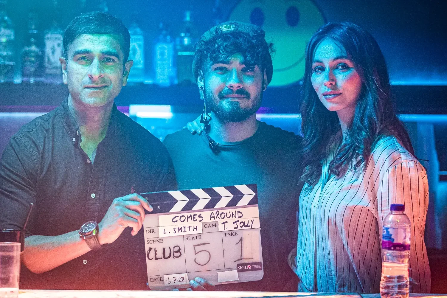 Cast and crew with clapperboard on music video shoot for Twelve Remain, Brighton