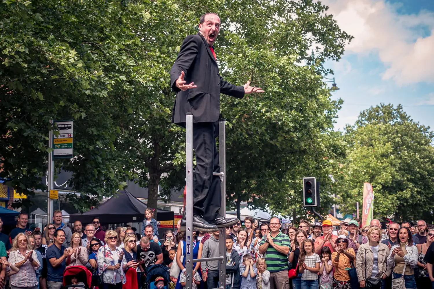 A male presenter talking to a corporate audience in an office environment.