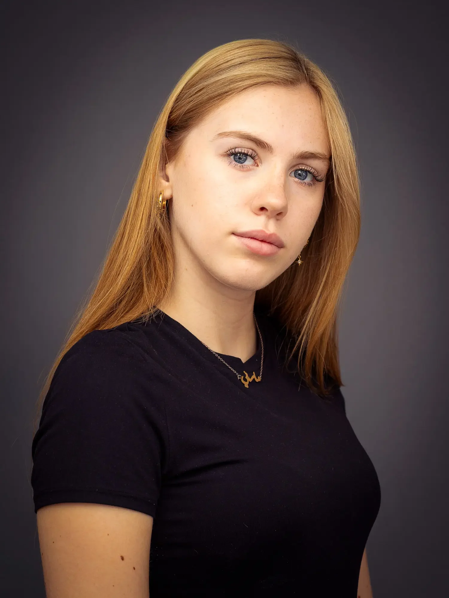 Three-quarter profile actor headshot showing angle and bone structure.