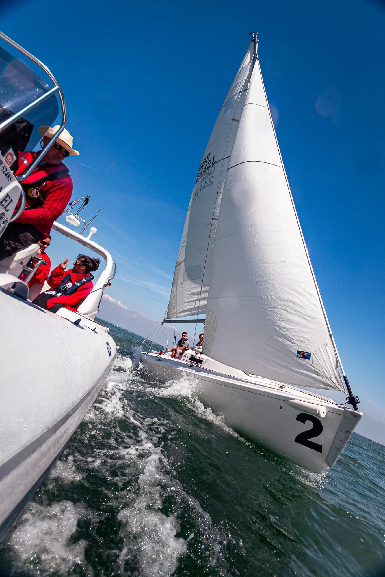 Sail close up shot of a racing yacht photographed from a chase boat off Cowes