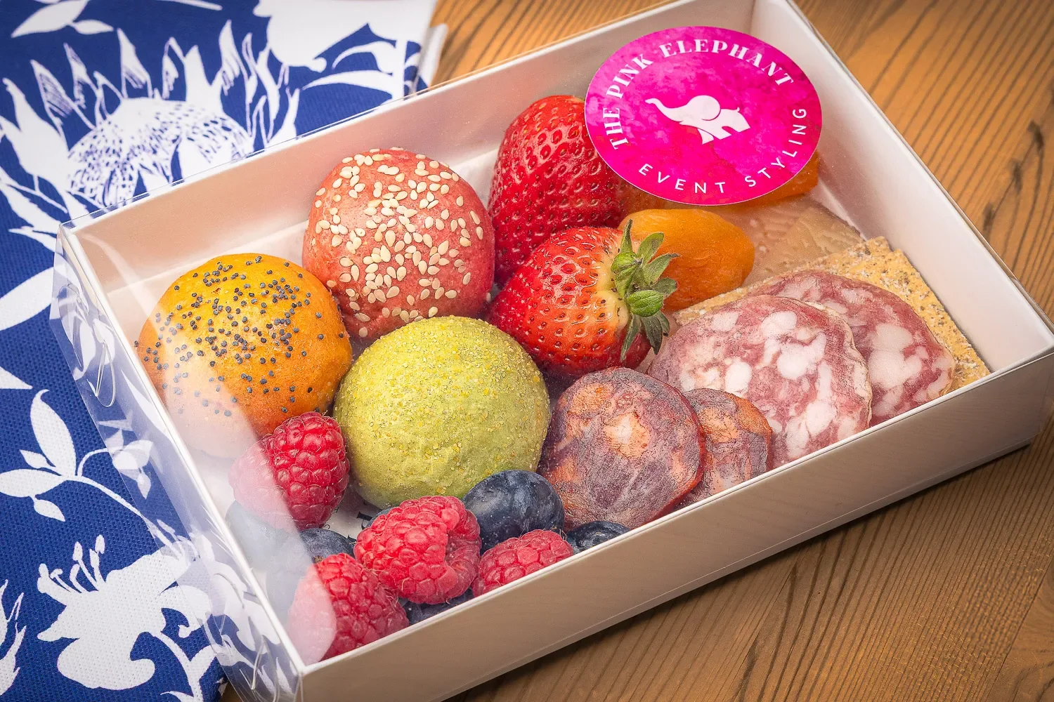 The Pink Elephant sweet charcuterie box — matcha truffles, strawberries, berries and artisan rolls, food photography St Albans