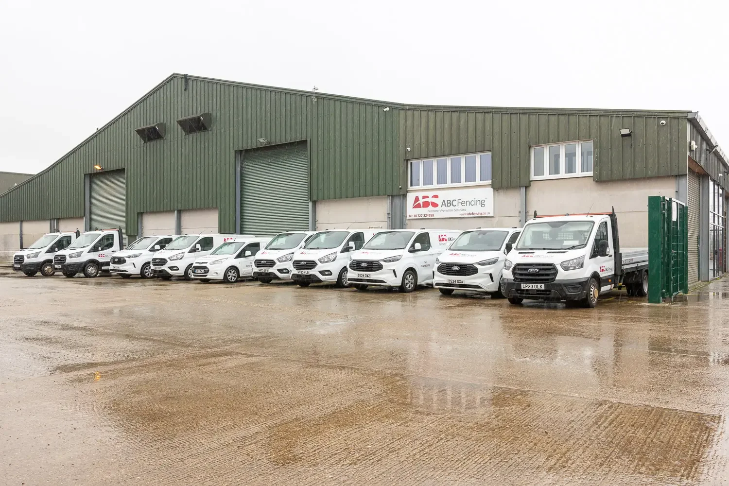 Corporate photography in Hertfordshire — ABC Fencing vehicle fleet photographed outside their Colney Heath premises by St Albans photographer Mike Dick