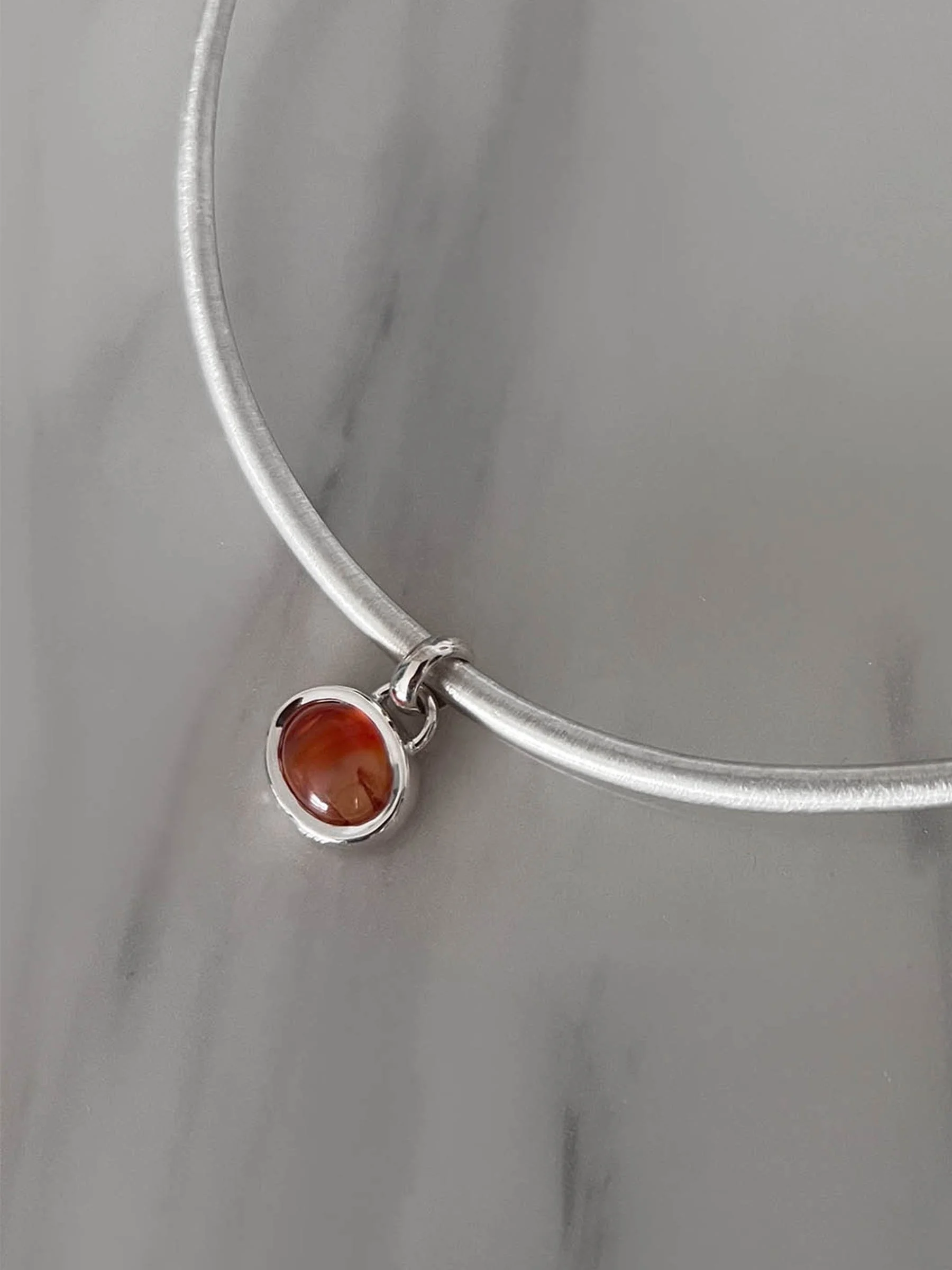 As autumn approaches, we begin to crave warmth.
Warmer colours, slower rituals, things that feel grounding and familiar.

Carnelian has long been associated with warmth, vitality and courage &mdash; a stone with an unmistakable autumnal glow.

This s