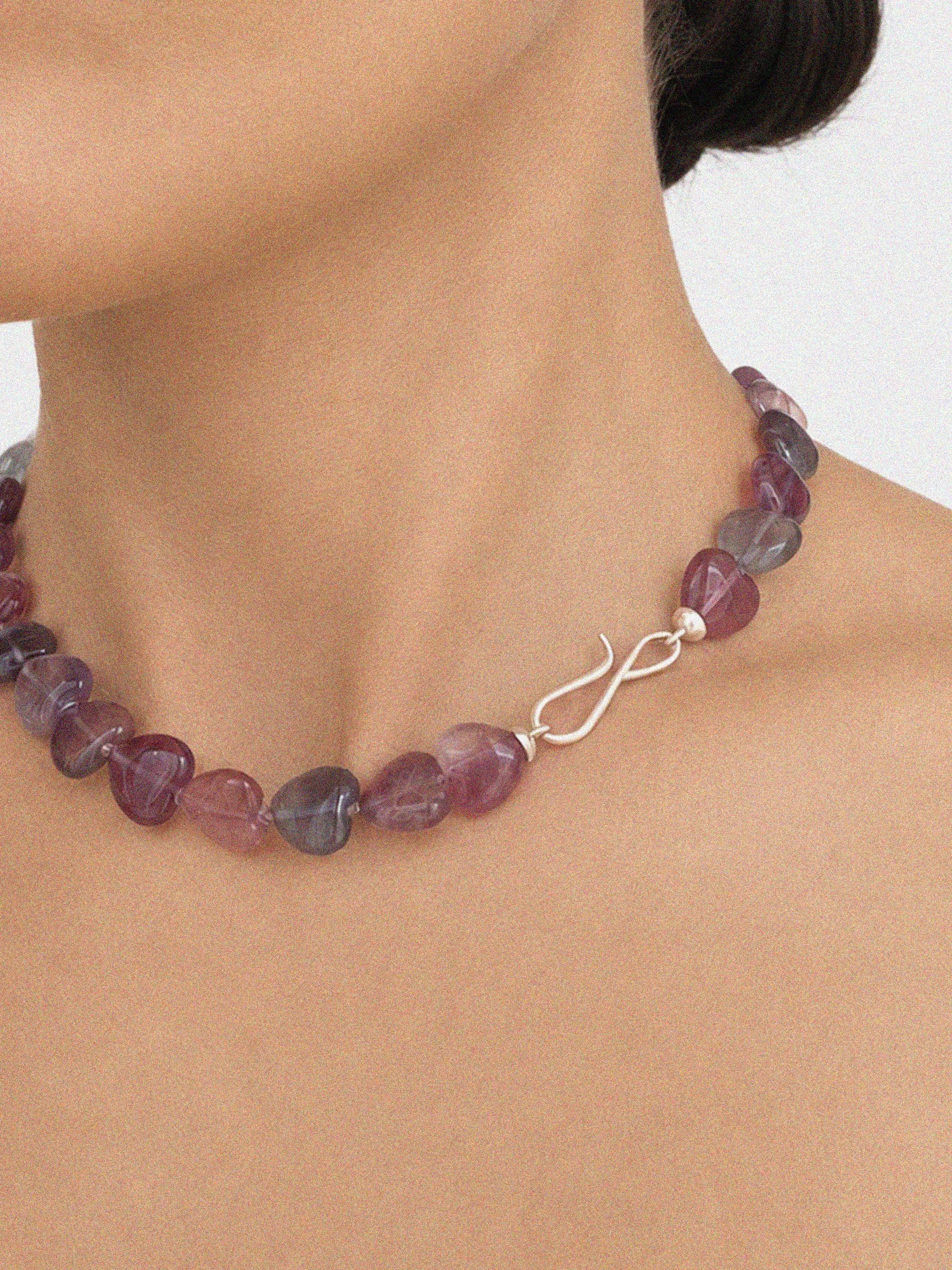 HERO_purple-fluorite-heart-gemstone-necklace-sterling-silver-clasp-lifestyle.jpg
