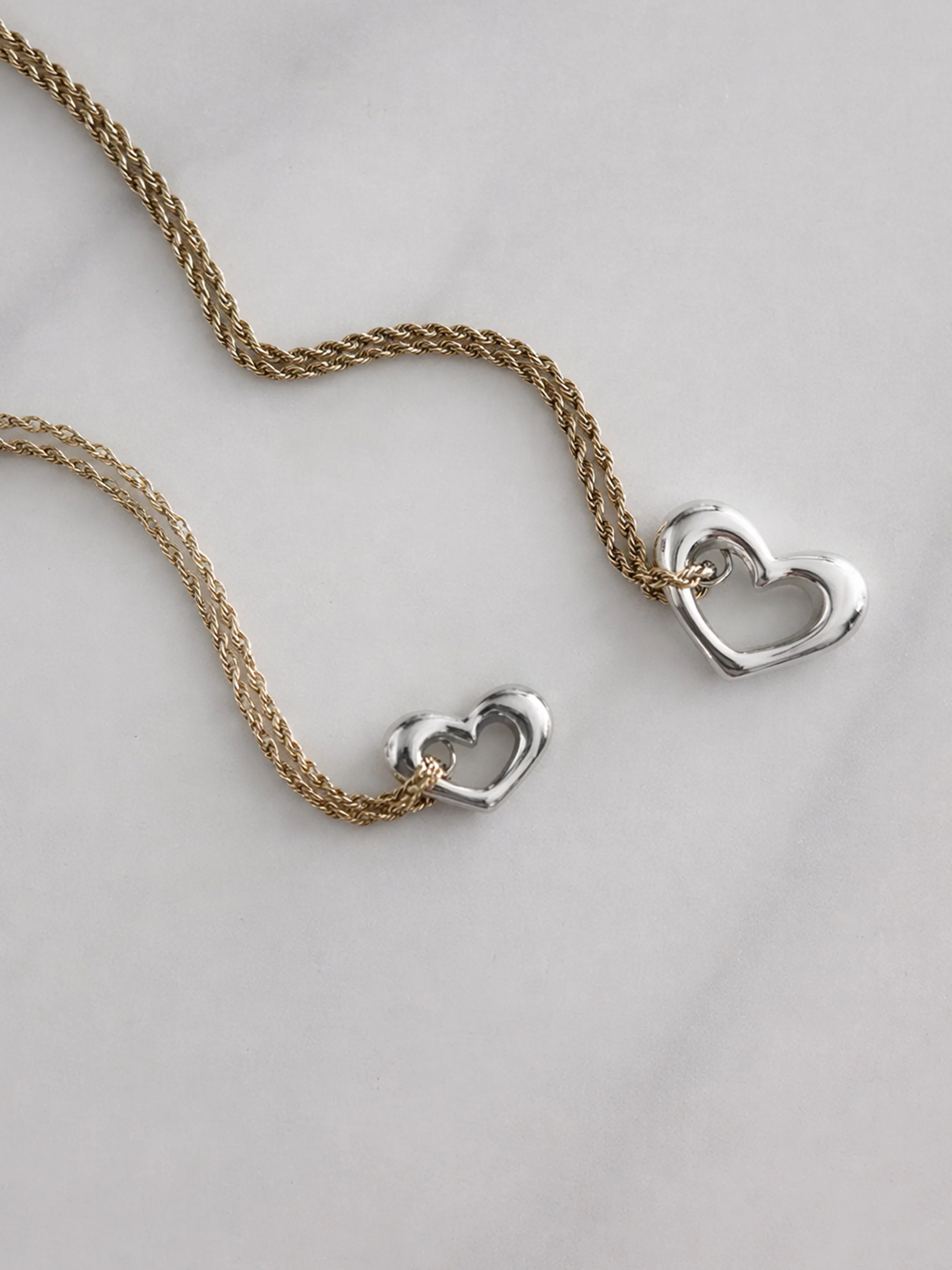 White Gold Chunky Hearts on Gold Chains.jpg