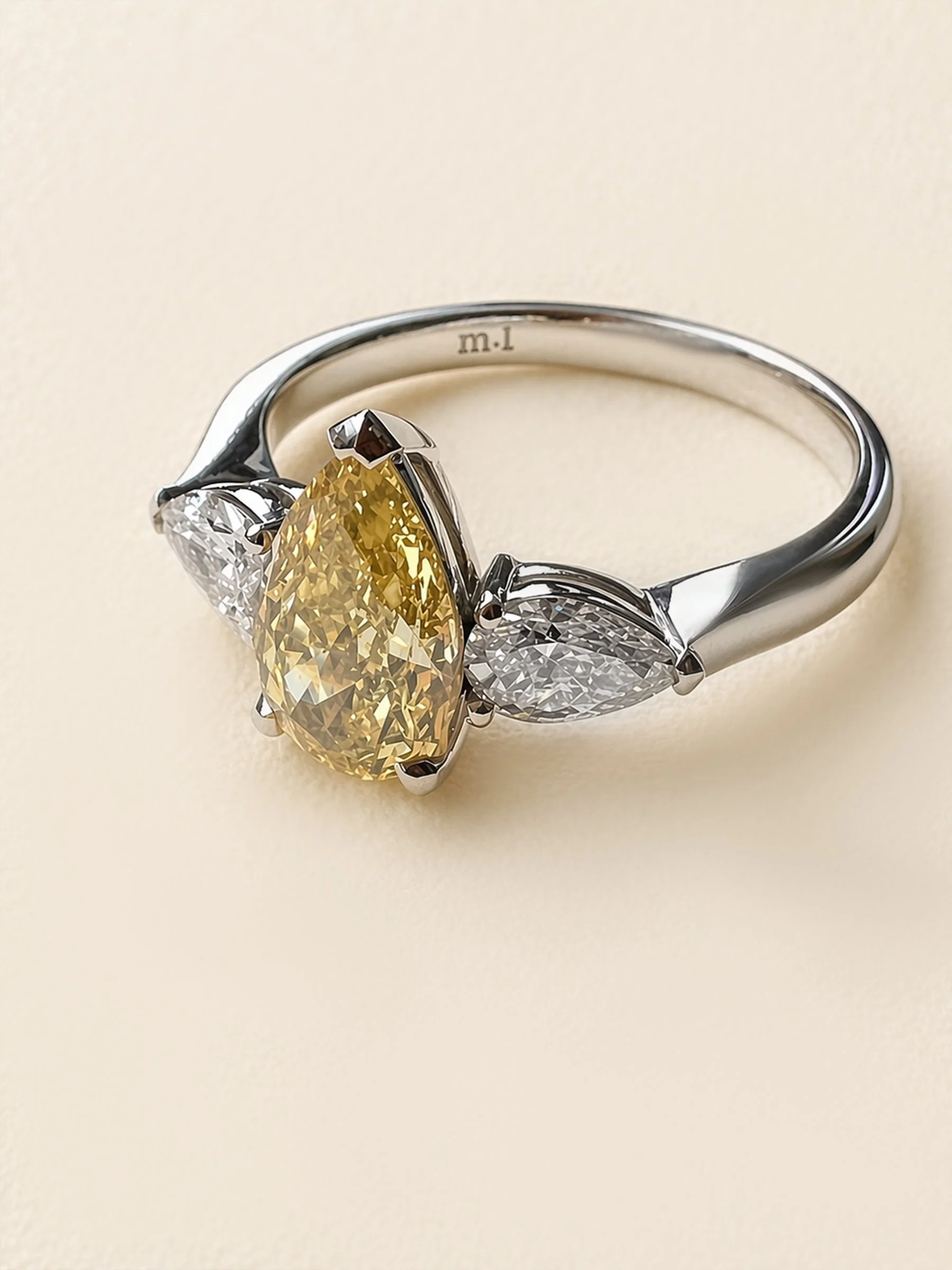 Canary Yeallow Pear Diamond Ring with Side Stones.jpg
