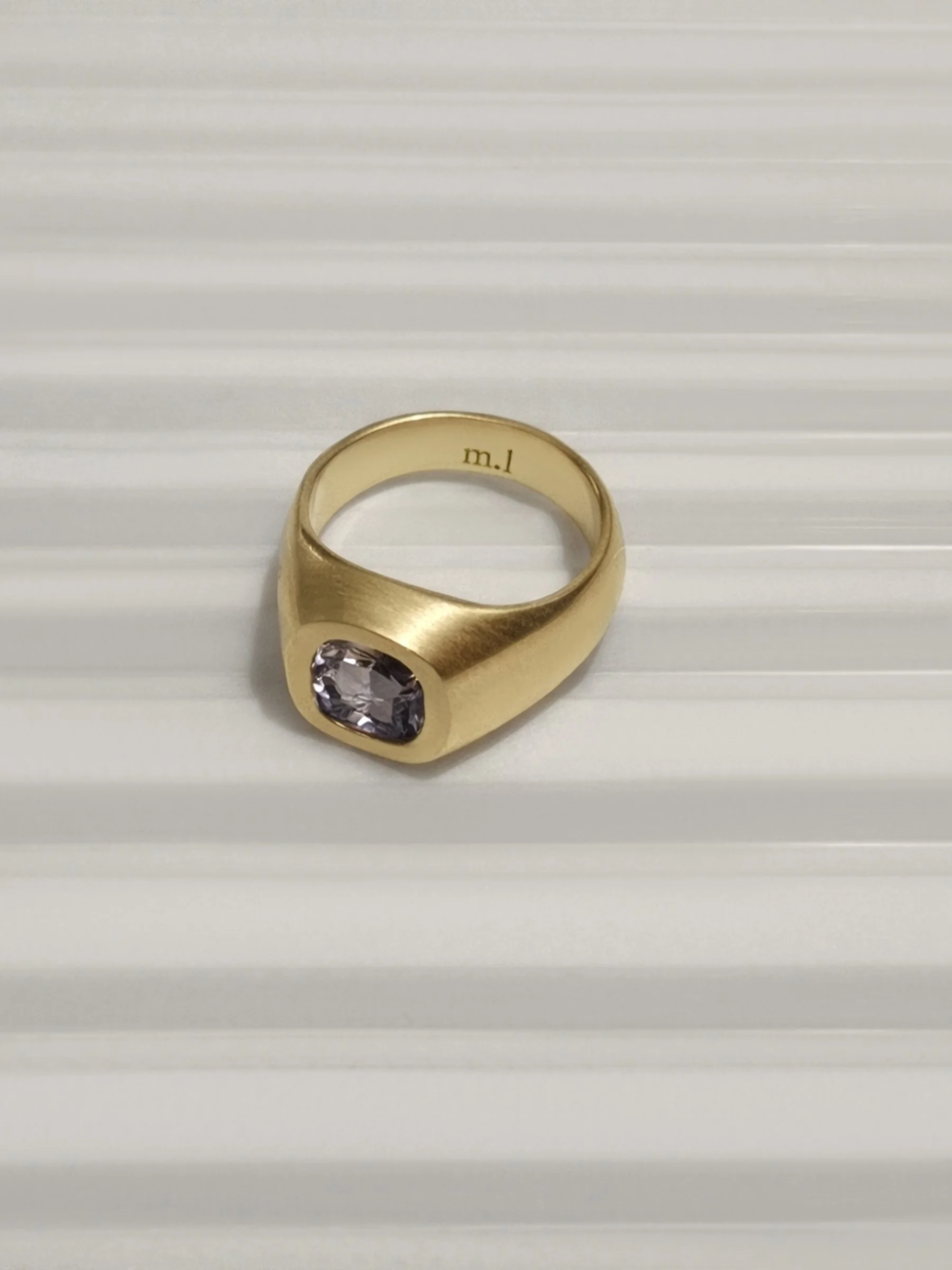 Cloudy purple spinel pinky ring in yellow gold.jpg