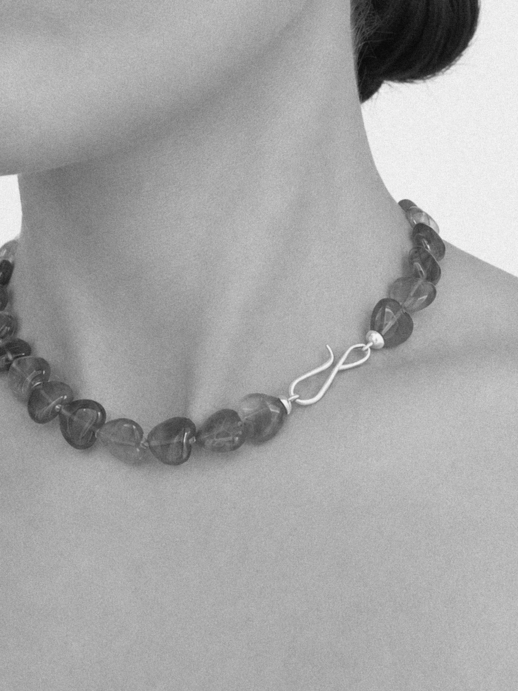 fluorite-heart-gemstone-necklace-sterling-silver-clasp-lifestyle.jpg