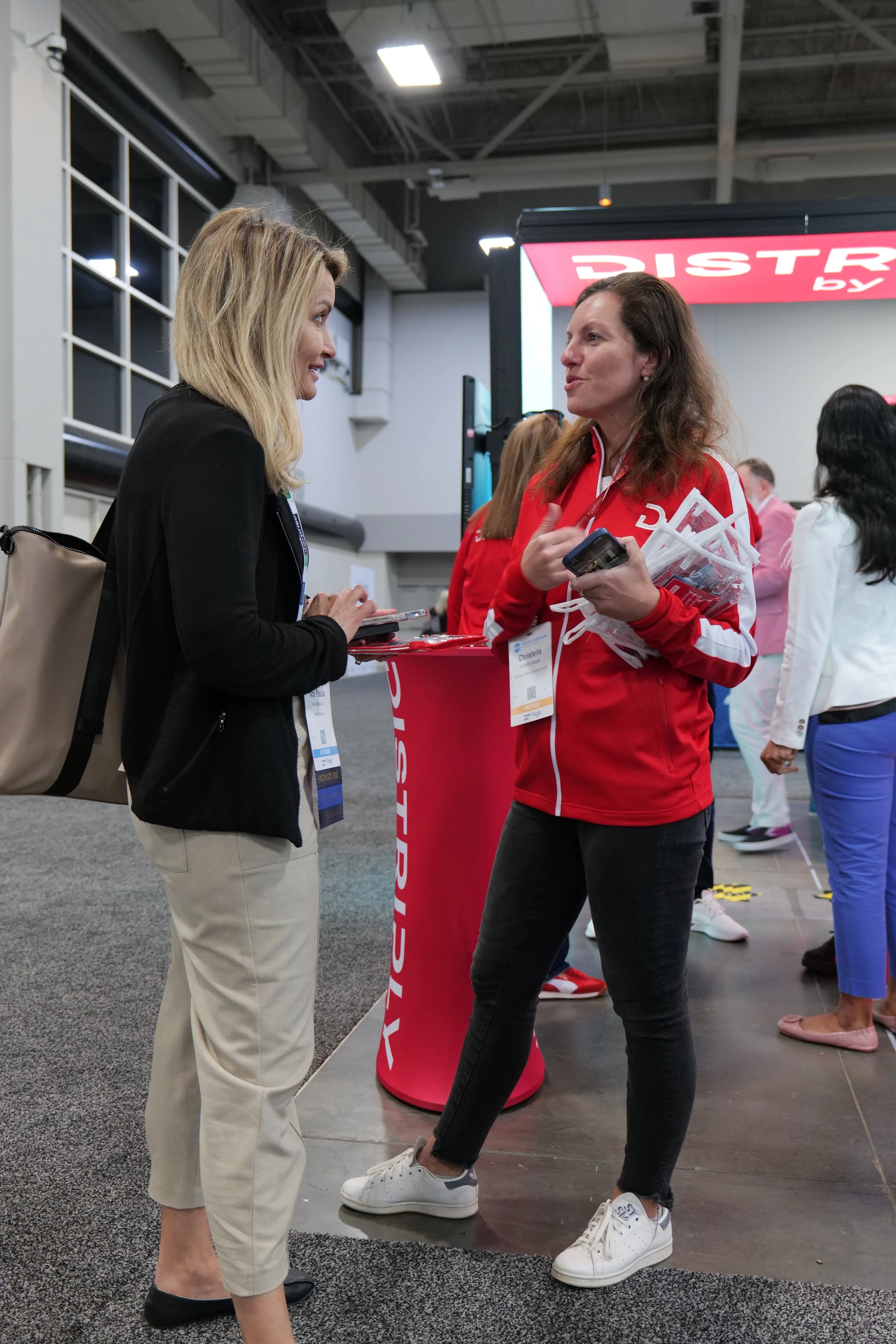 Hanh Air representatives engage with conference attendees at the ASTA Travel Advisor Conference in SLC, Utah. Enticer Media photography Salt Lake City, Utah.