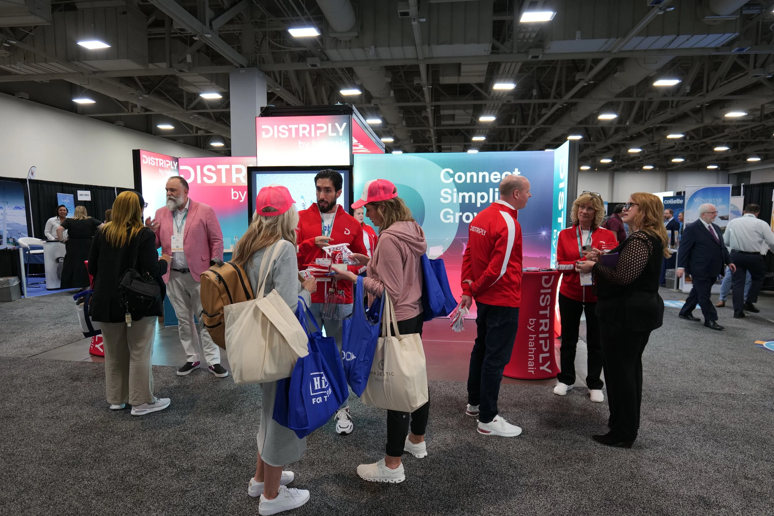 Hahn Air's Distriply booth at the ASTA Travel Advisor Conference in Salt Lake City, Utah. Enticer Media photography Salt Lake City, Utah.