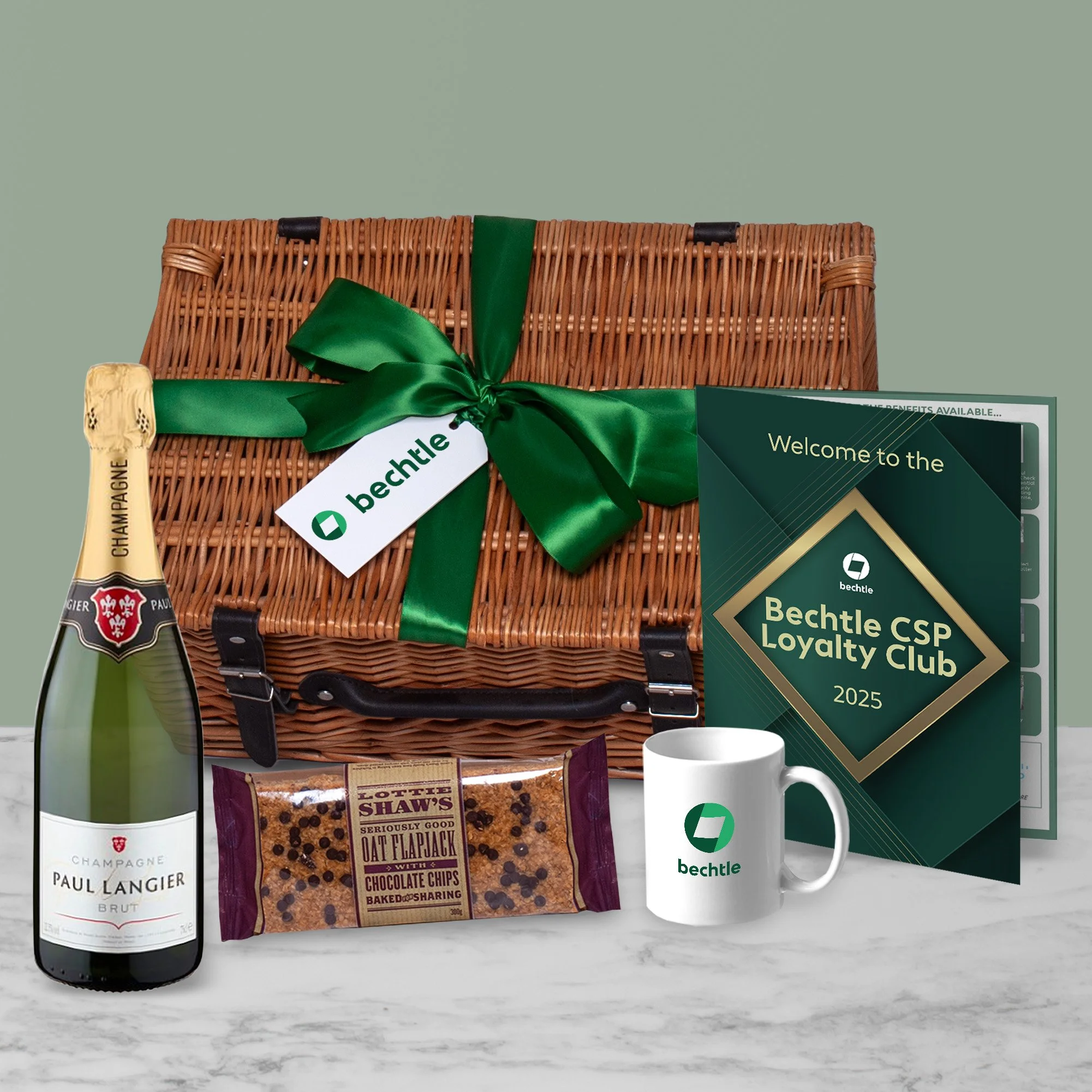 Branded Corporate Hamper in Wicker Basket with Champagne, Flapjack, Branded Mug & Folder for Bechtle