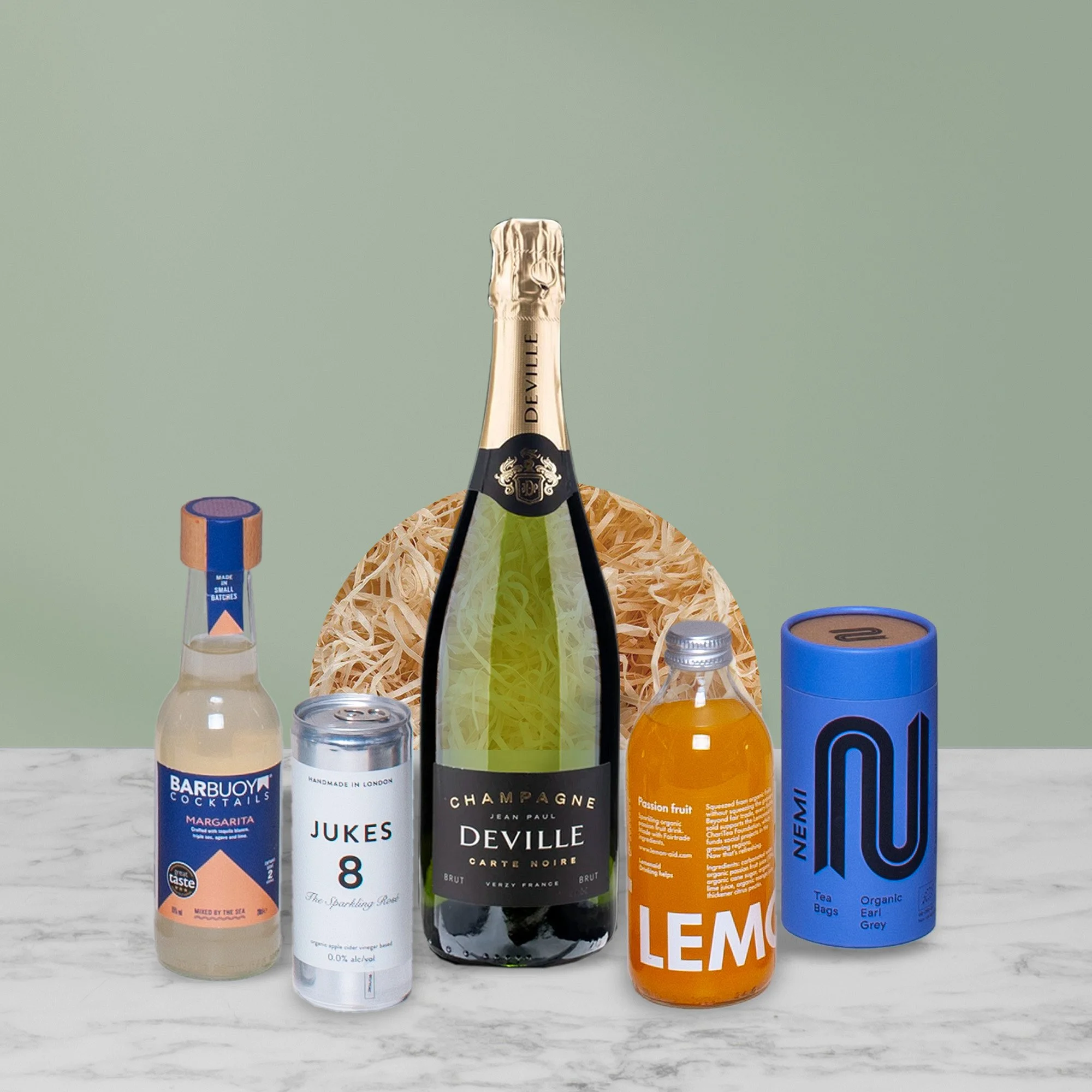 Selection of drinks for corporate hampers including champagne, cocktails, alcohol-free drinks, tea and coffee.