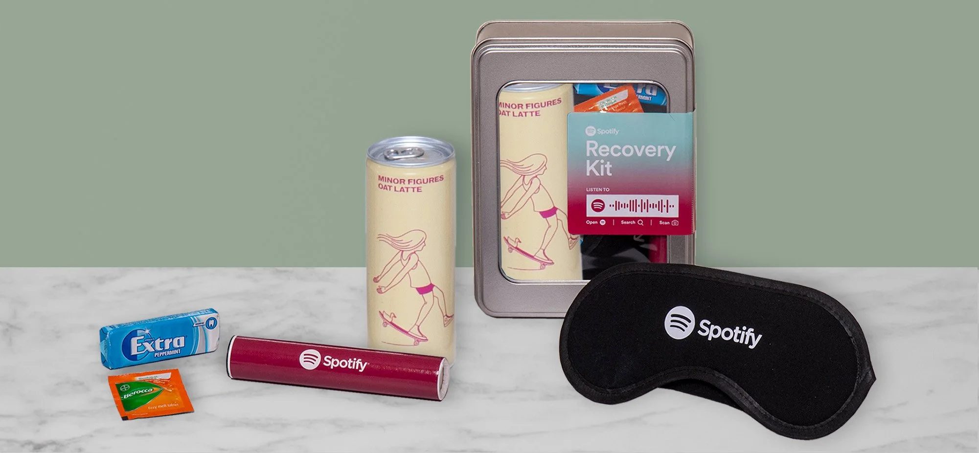 Branded Recovery Kit for Spotify in Gift Tin with Personalised Label, including Chewing Gum, Berocca Tablet, and Personalised Sweets and Sleep Mask.