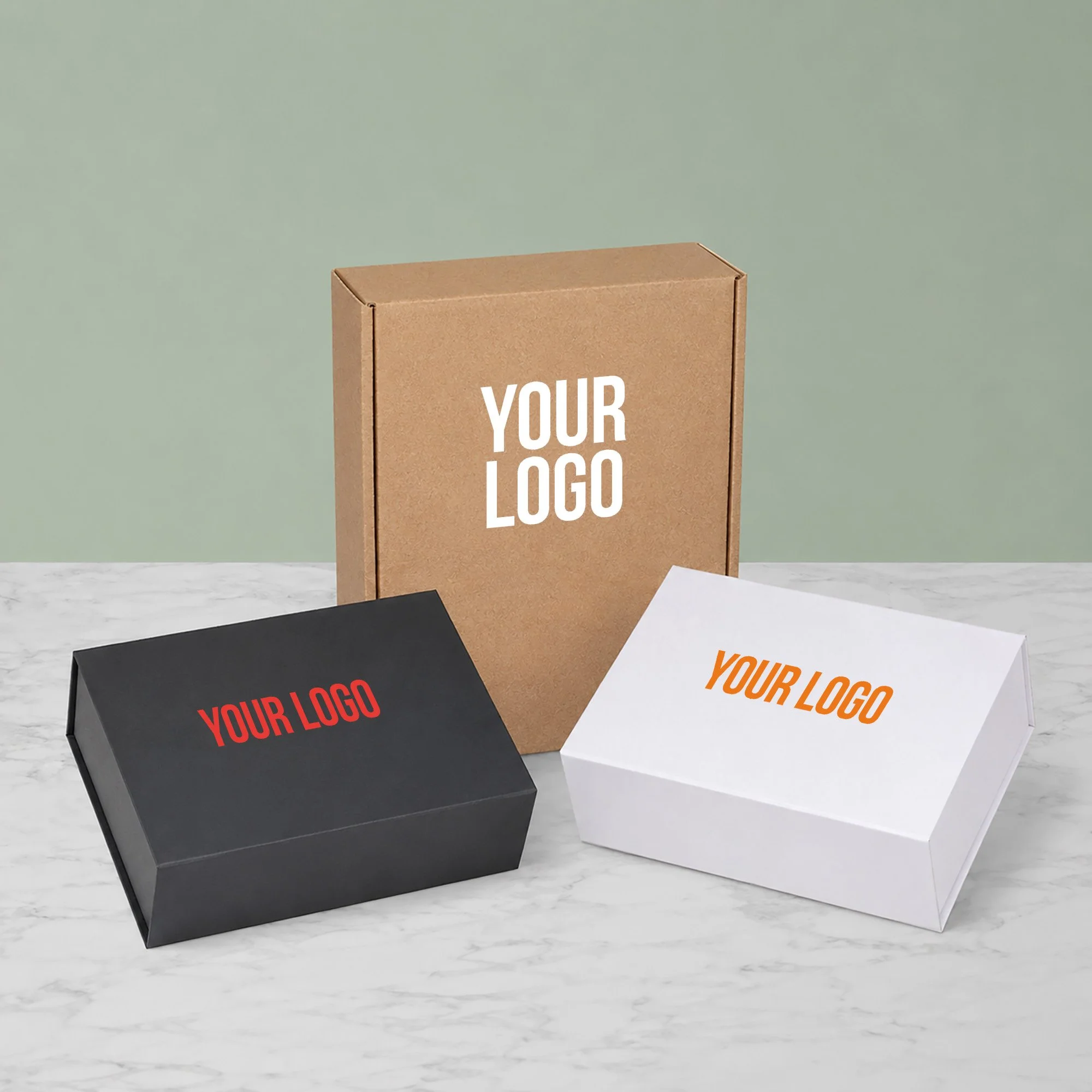 Branded gift boxes in kraft, white and black with custom logo printing for corporate hamper packaging