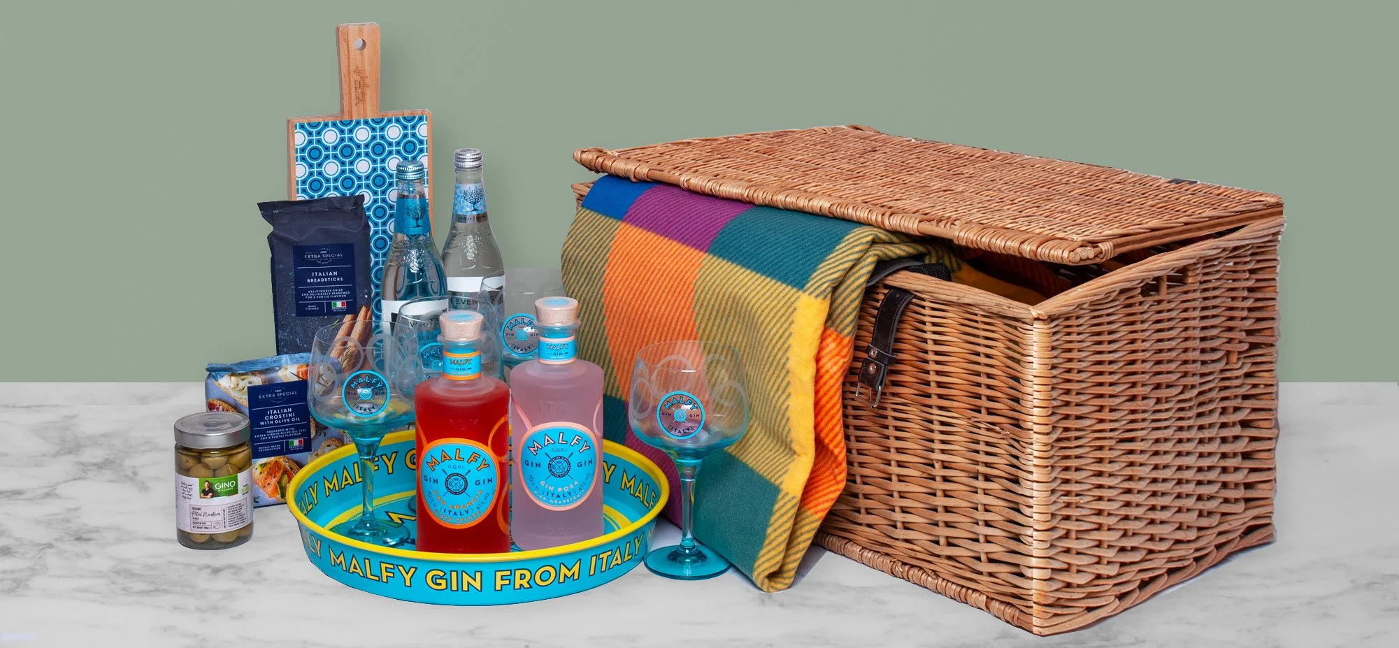 Branded Prize Hamper in Wicker Basket with Malphy Gin, Branded Glasses & Tray, Serving Tray, Blanket, Tonic & Snacks.