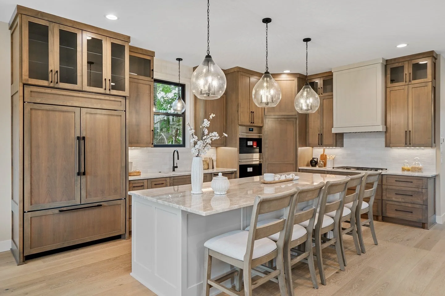 ✨ The ultimate kitchen flex!! A hidden pantry that keeps the chaos out of sight and the style front and center. 👀🍽️ #DreamKitchen #HiddenPantry #LuxuryHomes #KitchenDesign #MinneapolisHomes #HomeGoals #InteriorDesign #LuxuryLiving #ModernKitchen #M