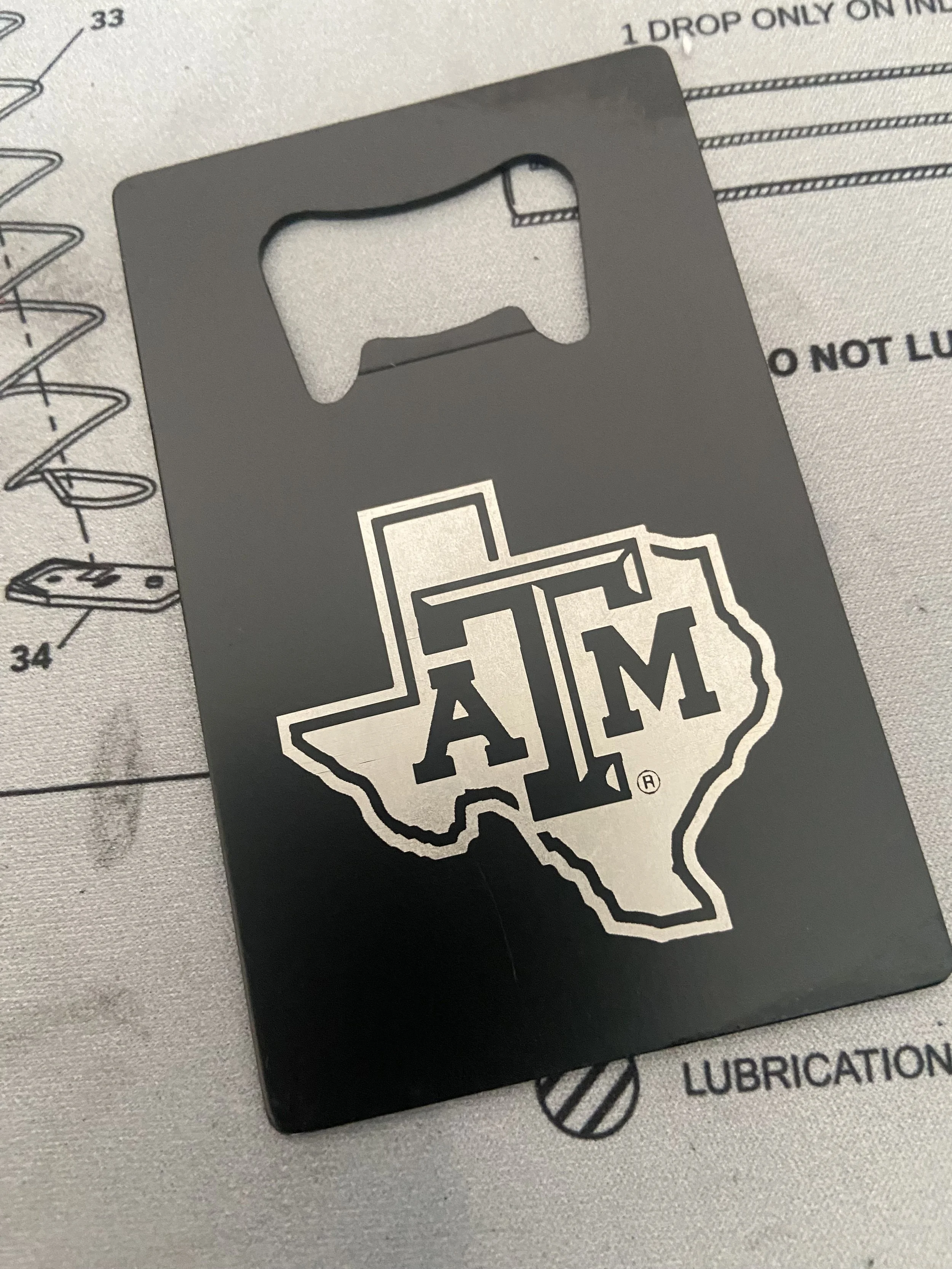 TAMU Bottle Card Opener.jpeg