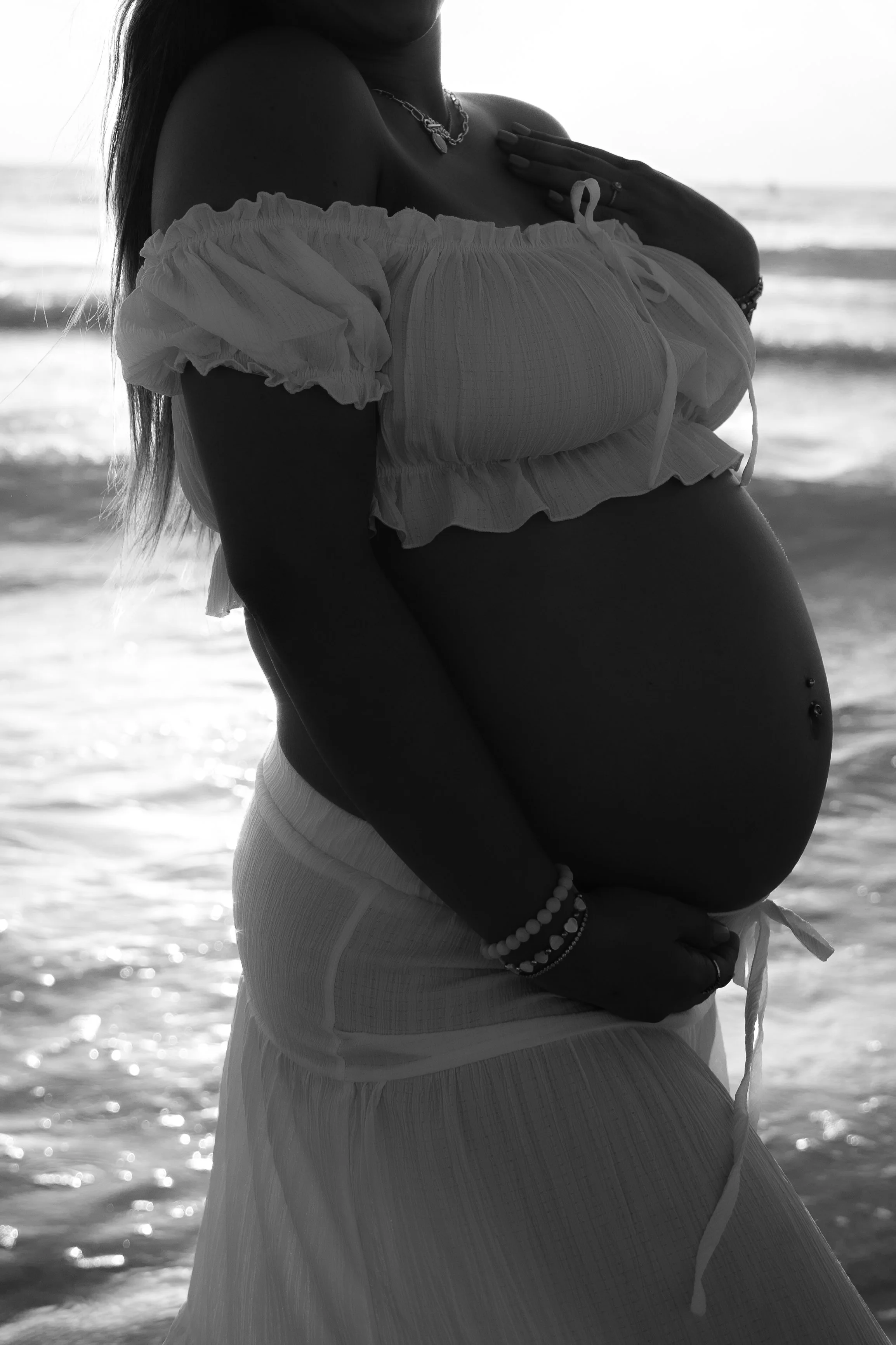Young woman with curly hair wearing a blue denim jacket