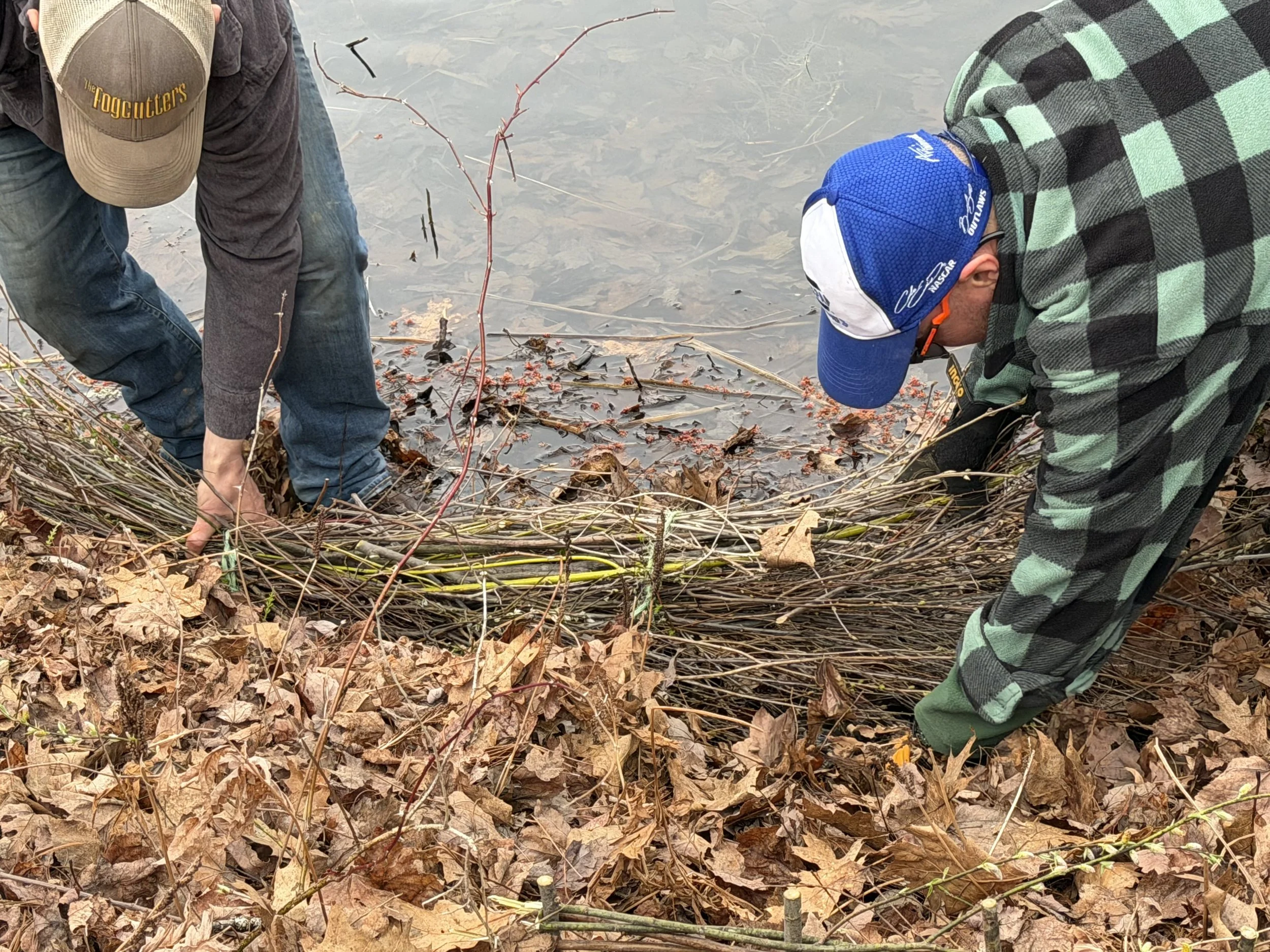Jordan and John installing a fascine