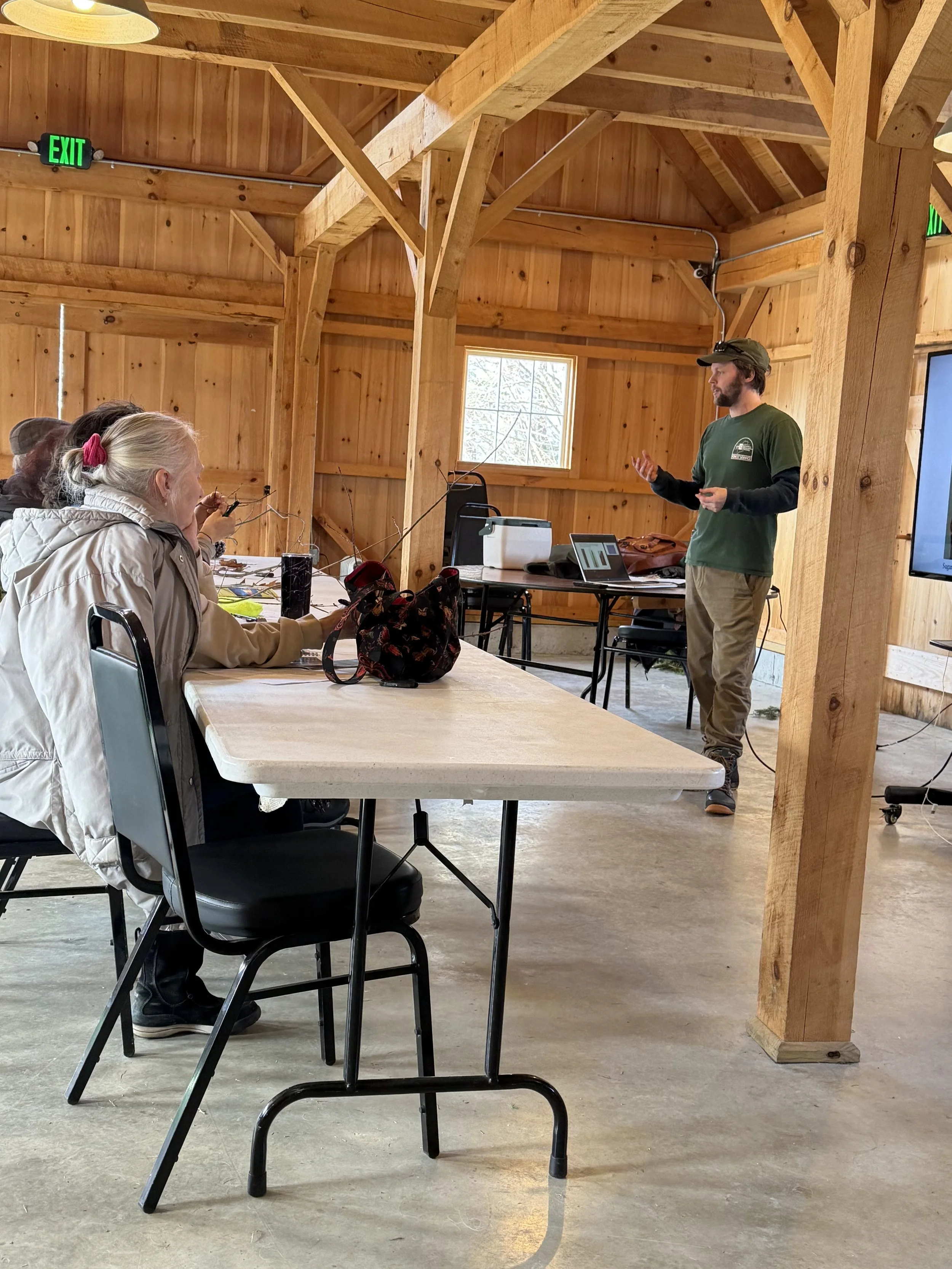 Attendees learning winter identification features