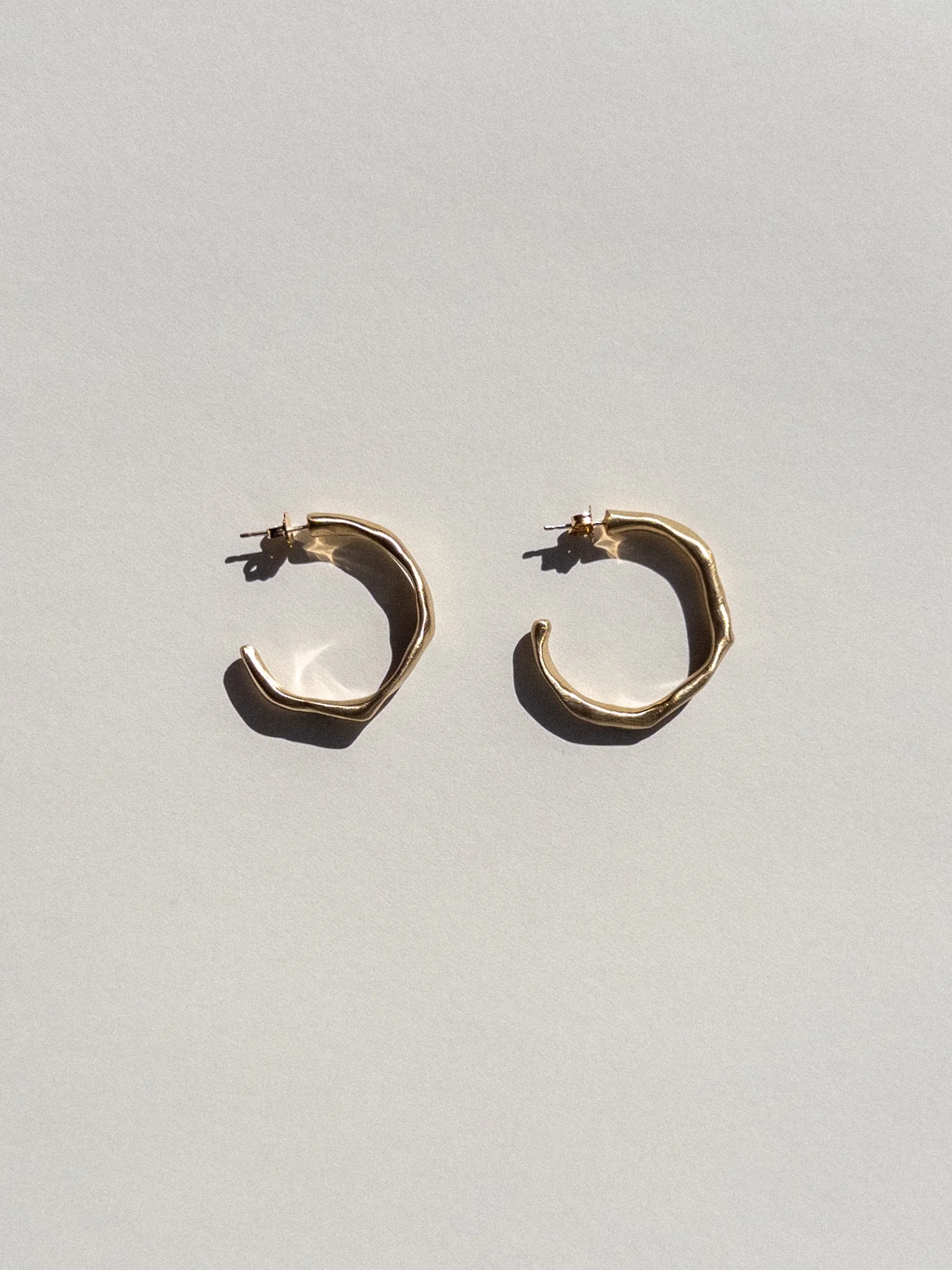 wonky brass hoops