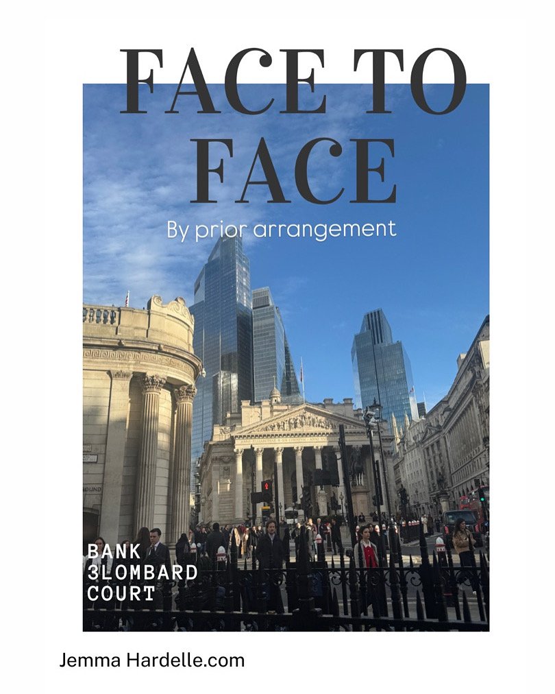 A cityscape with tall modern skyscrapers, historic classical buildings, and a busy street with pedestrians, signs, and traffic lights in the foreground.