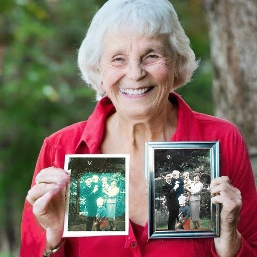 photo satisfied customer showing her photo restoration