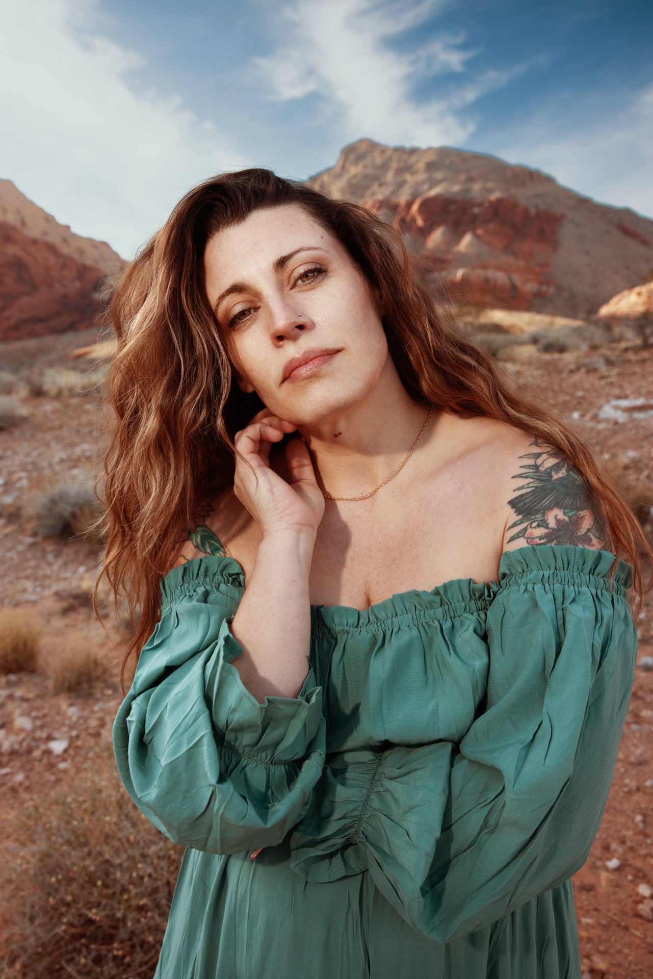 desert-landscape-blue-sky-portrait-woman-green-dress.jpg