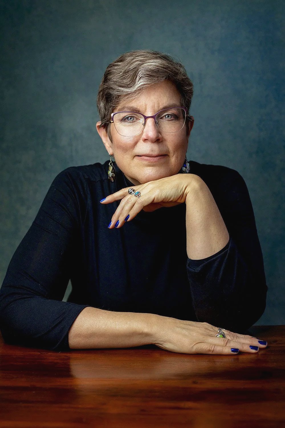 silver-short-haired-woman-glasses-headshot-almhult-sweden.jpg