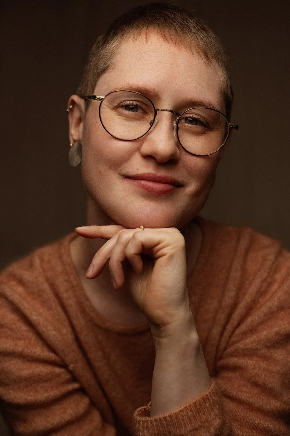 short-haired-woman-glasses-headshot-closeup-copenhagen-denmark.jpg