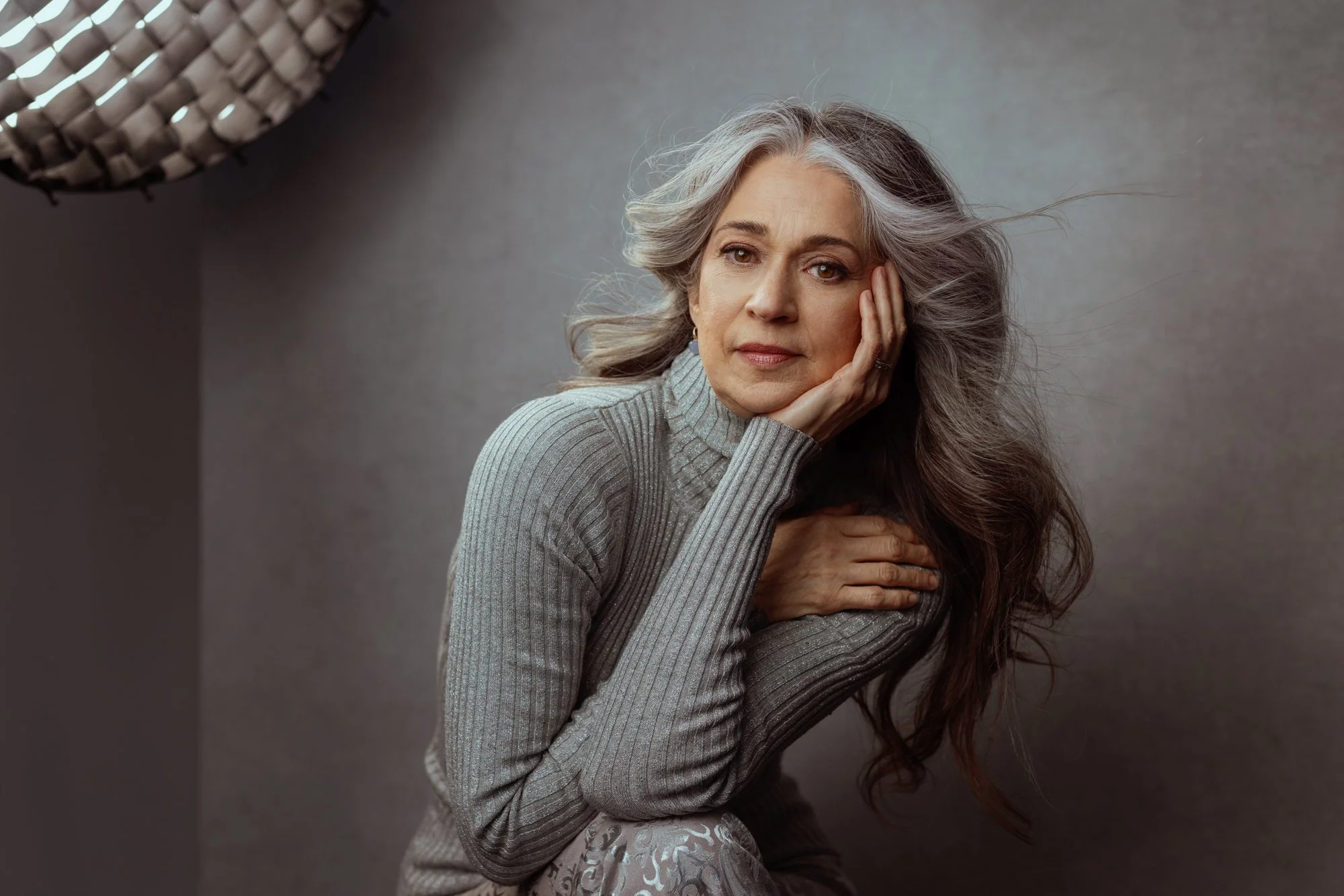 silver-haired-mature-woman-grey-shirt-headshot-photography.jpg