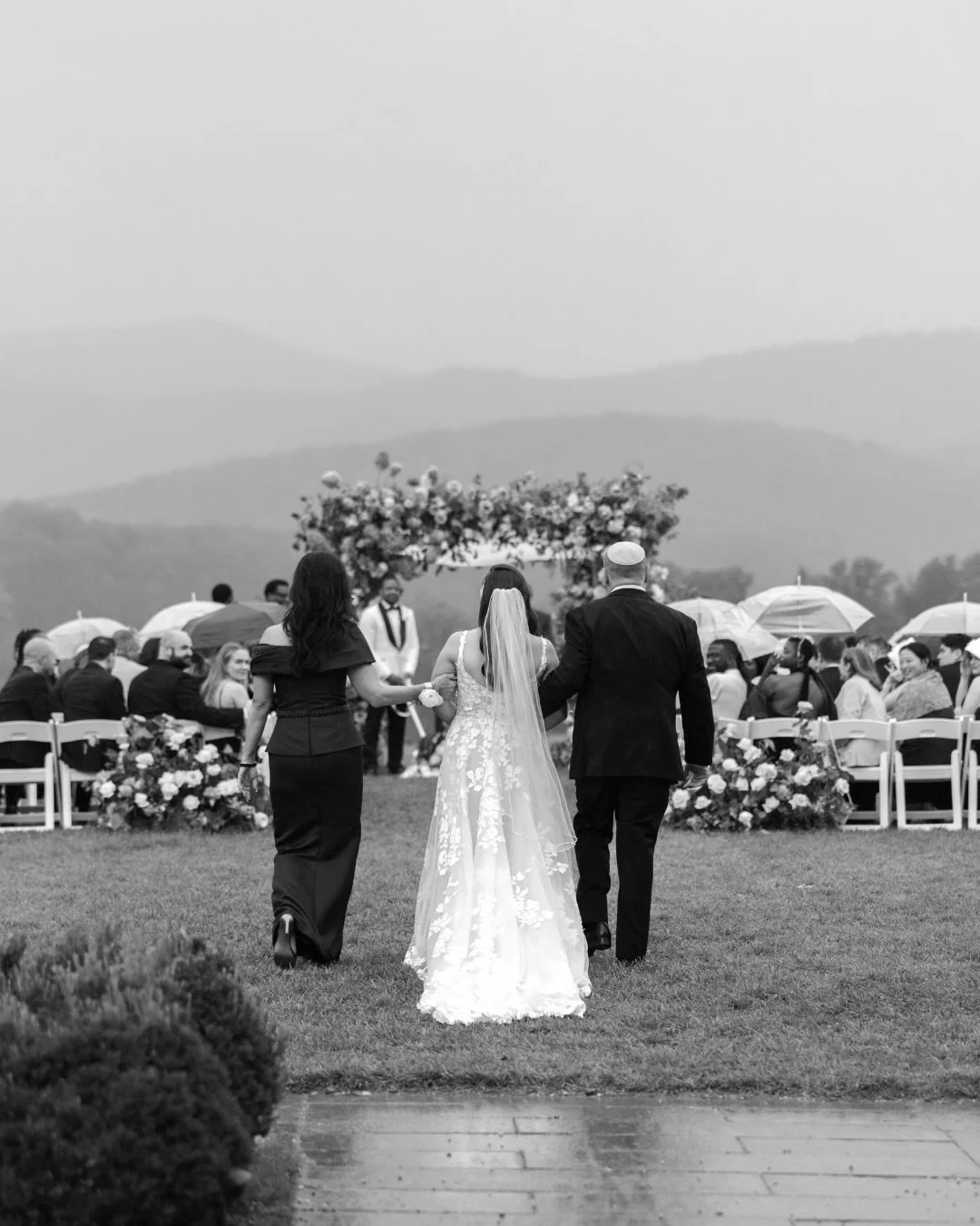 There&rsquo;s a creative freedom in capturing a wedding from a different perspective. It feels more unnoticed. Leaning into quiet moments, small movements, and the in-between.

Capturing this quietly romantic day, soft moody skies, vibrant greens &am
