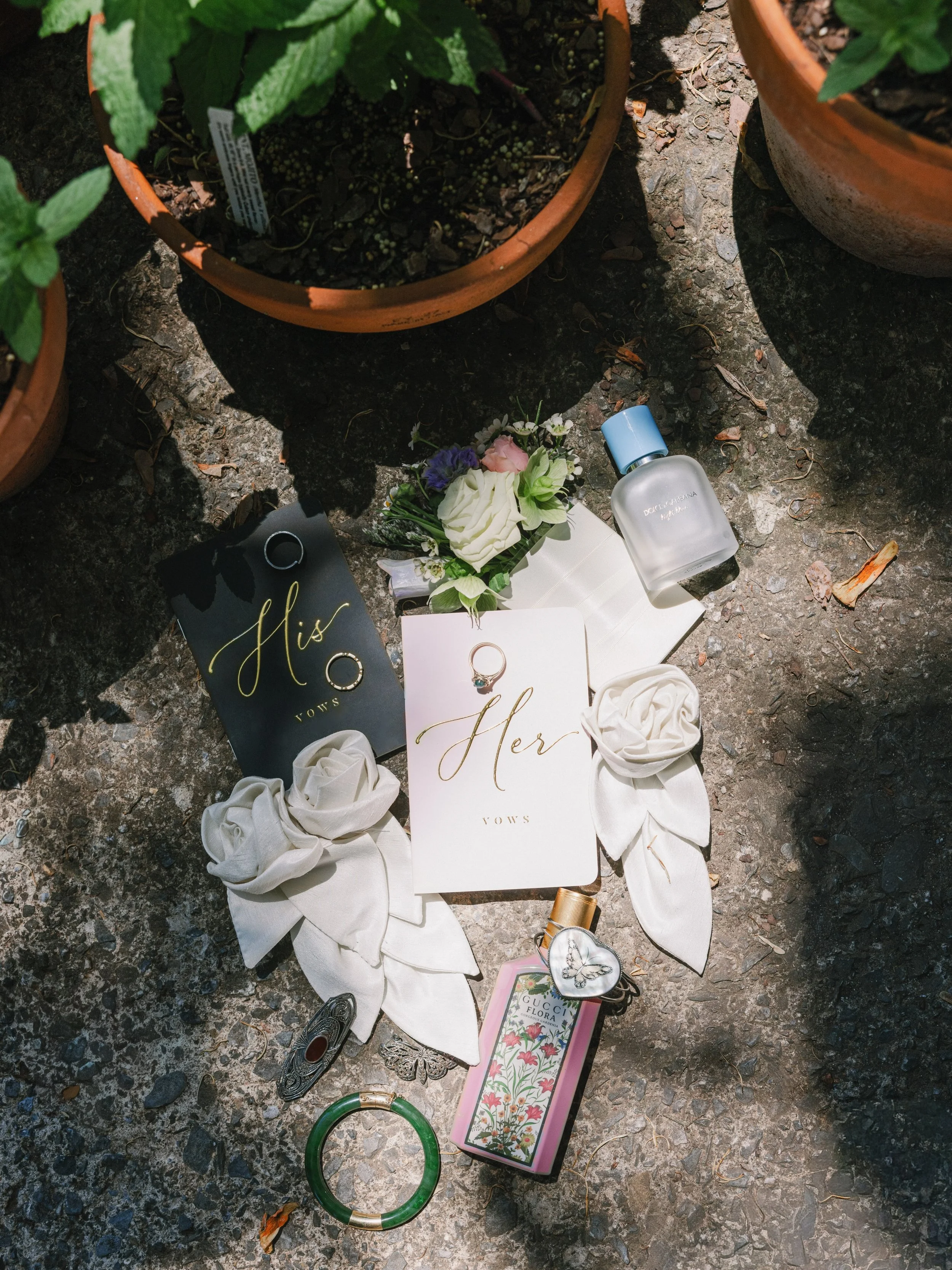 A classic lay flat on a linen backdrop or a dress hanging in the window picture are always beautiful on their own. But when the backdrop can help tell a story with your details it adds an extra layer of depth to the image.