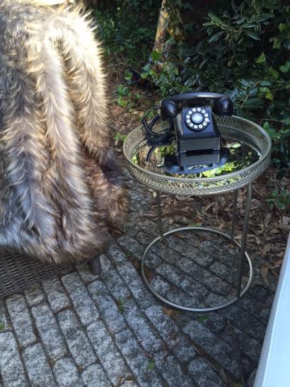Vintage Phone with our furry blanket to keep guests warm at Walker World Organic Artist Retreat