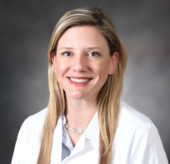 Ashley Clark, DDS, FACD, FICD, FAAOMP