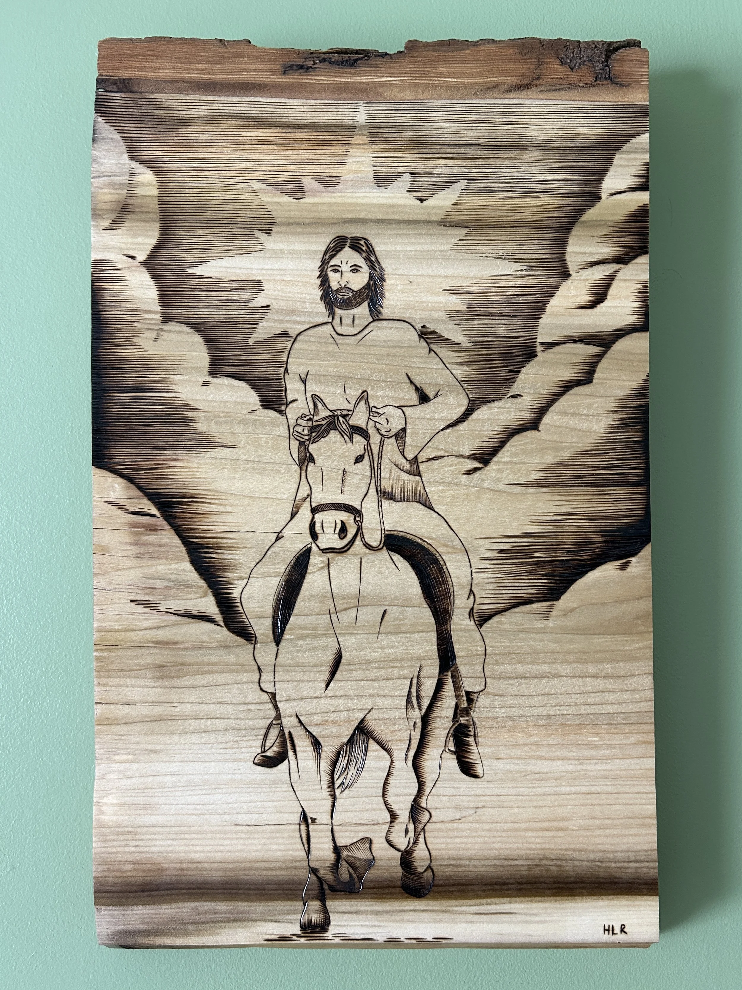A woodcut-style image of Jesus riding through the clouds on horseback with a sunburst behind his head