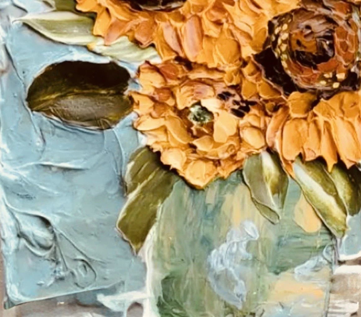 Detail of floral painting of vase featuring yellow-orange flowers, highly textured, with a muted blue background.