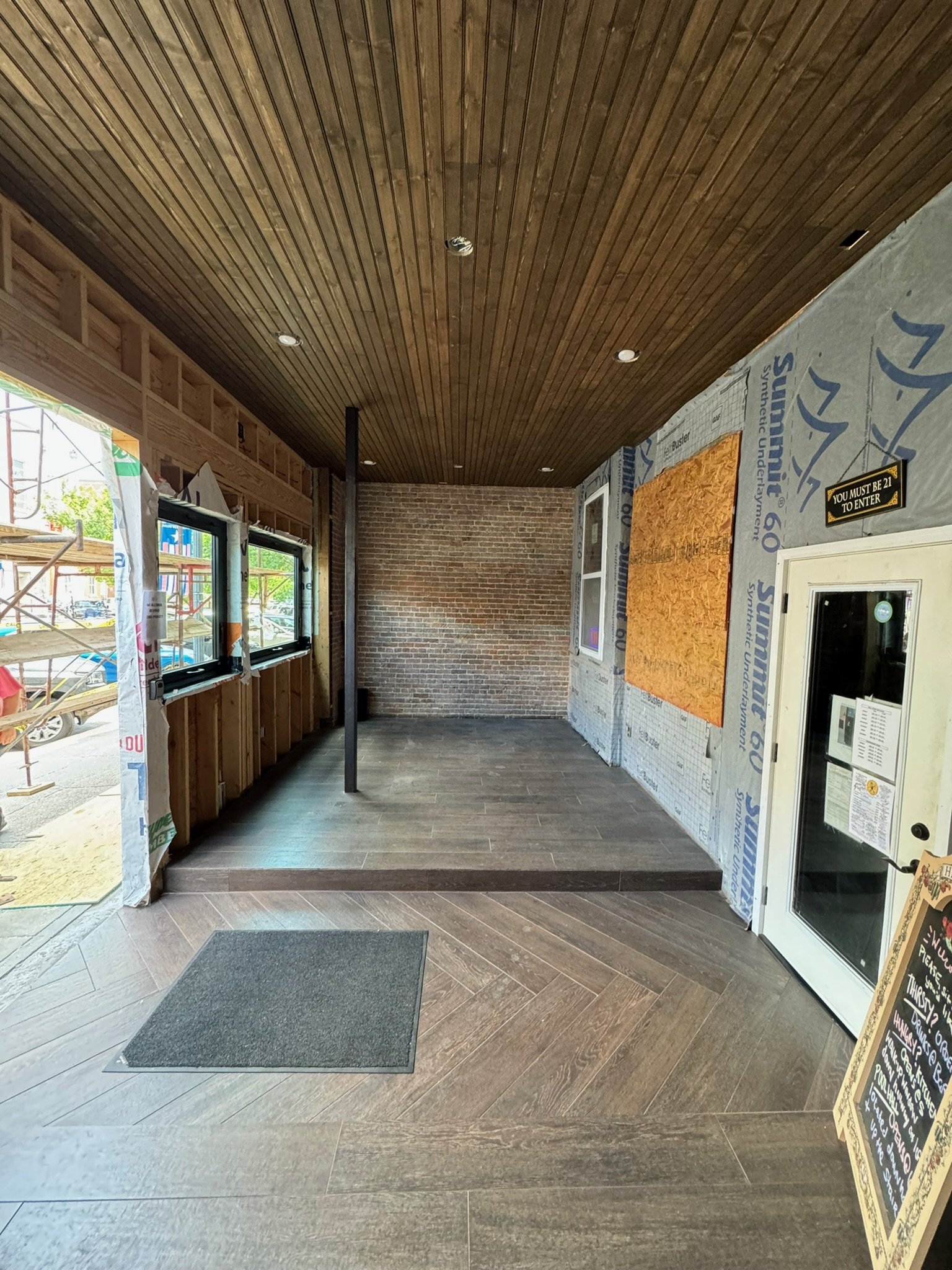 Tongue and groove wood ceiling for a bar on the Murfreesboro town square. Stained/sealed and installed. 