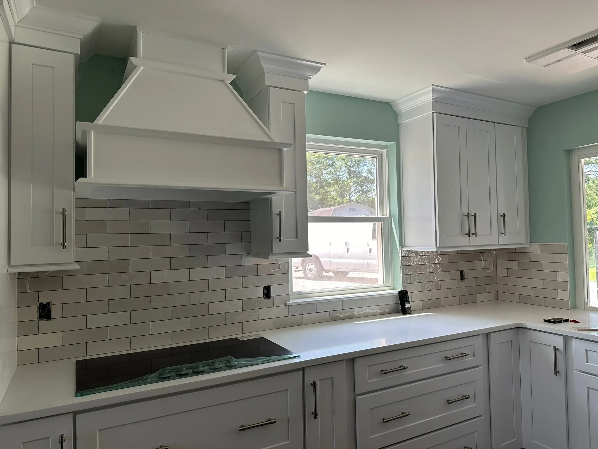 Kitchen upgrade - countertops, backsplash, paint. 